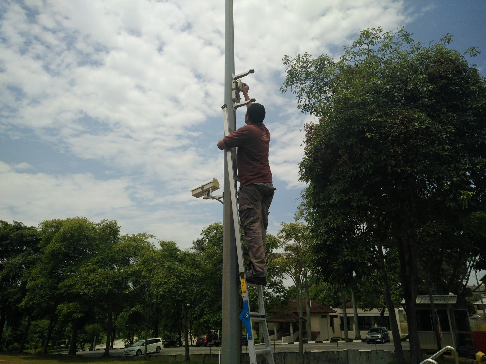 working on a cctv pole - maintenance job